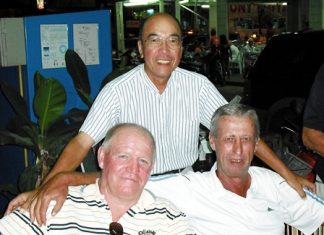 Rab McDonald, front left, celebrates with Geoff Parker, right, and Mashi after winning the A Flight at Bangpra.